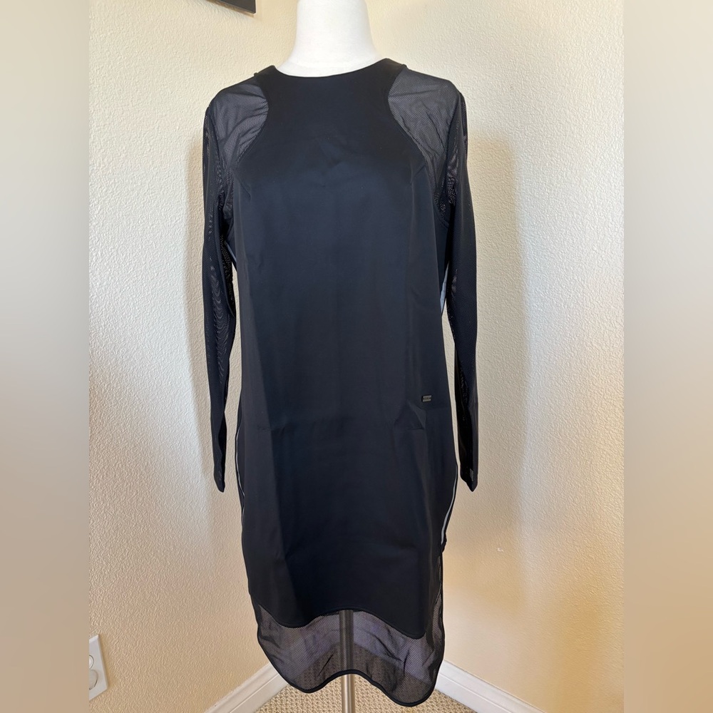 NWT Titika Active Couture black dress with mesh shoulder and sleeve. Size Medium